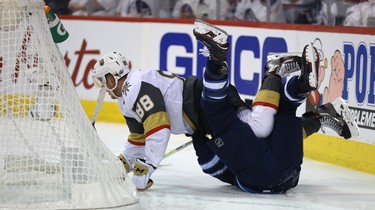 Vegas Golden Knights defenceman Nate Schmidt winds up on top of Winnipeg Jets centre Mark Scheifele during Game 2 of the Western Conference final in Winnipeg on Mon., May 14, 2018. Kevin King/Winnipeg Sun/Postmedia Network