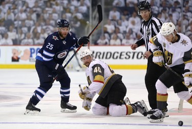 Winnipeg Jets centre Paul Stastny follows the puck after facing off with Vegas Golden Knights centre Ryan Carpenter during Game 2 of the Western Conference final in Winnipeg on Mon., May 14, 2018. Kevin King/Winnipeg Sun/Postmedia Network