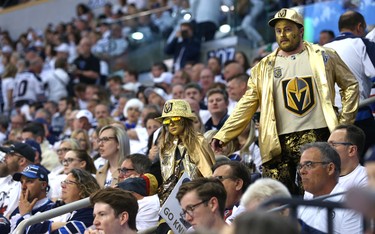Vegas Golden Knights fans work to get closer to the action during Game 2 of the Western Conference final against the Winnipeg Jets in Winnipeg on Mon., May 14, 2018. Kevin King/Winnipeg Sun/Postmedia Network
