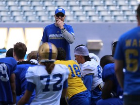 Head coach Mike O'Shea looks out over the players during the opening day of Winnipeg Blue Bombers rookie camp at Investors Group Field in Winnipeg on Wed., May 16, 2018. Kevin King/Winnipeg Sun/Postmedia Network