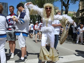 Lynda Thompson all dolled up for the Whiteout Street Party before the Winnipeg Jets battled the Vegas Golden Knights during Game 5 of the Western Conference final in Winnipeg on Sun., May 20, 2018. Kevin King/Winnipeg Sun/Postmedia Network