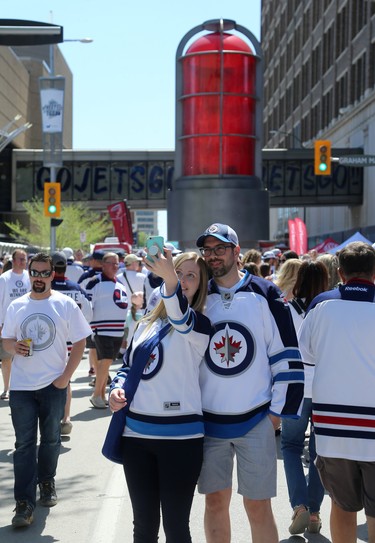 The goal light has become selfie central at the Whiteout Street Party before the Winnipeg Jets battled the Vegas Golden Knights during Game 5 of the Western Conference final in Winnipeg on Sun., May 20, 2018. Kevin King/Winnipeg Sun/Postmedia Network