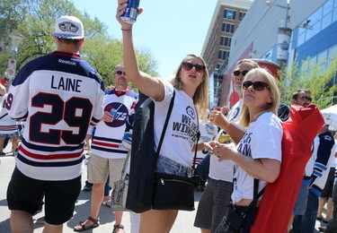 Fans geared up for the Whiteout Street Party before the Winnipeg Jets battled the Vegas Golden Knights during Game 5 of the Western Conference final in Winnipeg on Sun., May 20, 2018. Kevin King/Winnipeg Sun/Postmedia Network