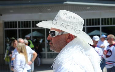 A fan geared up at the Whiteout Street Party before the Winnipeg Jets battled the Vegas Golden Knights during Game 5 of the Western Conference final in Winnipeg on Sun., May 20, 2018. Kevin King/Winnipeg Sun/Postmedia Network