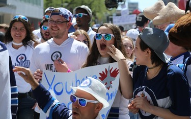 Fans in a celebratory mood at the Whiteout Street Party before the Winnipeg Jets battled the Vegas Golden Knights during Game 5 of the Western Conference final in Winnipeg on Sun., May 20, 2018. Kevin King/Winnipeg Sun/Postmedia Network