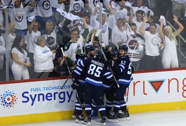 Winnipeg Jets defenceman Josh Morrissey and teammates celebrates his goal against the Vegas Golden Knights during Game 5 of the Western Conference final in Winnipeg on Sun., May 20, 2018. Kevin King/Winnipeg Sun/Postmedia Network