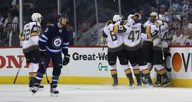 Vegas Golden Knights forward Ryan Reaves (second from right) celebrates his goal during Game 5 of the Western Conference final in Winnipeg as Winnipeg Jets forward Brandon Tanev skates by on Sun., May 20, 2018. Kevin King/Winnipeg Sun/Postmedia Network