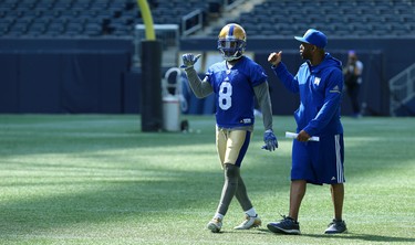 Defensive back Chris Randle (left) in discussion with defensive backs coach Jordan Younger during Winnipeg Blue Bombers training camp at Investors Group Field in Winnipeg on Wed., May 23, 2018. Kevin King/Winnipeg Sun/Postmedia Network