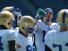 Receiver Rashaun Simonise hydrates during Winnipeg Blue Bombers training camp at Investors Group Field in Winnipeg on Wed., May 23, 2018. Kevin King/Winnipeg Sun/Postmedia Network