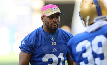 Defensive back Maurice Leggett, who is coming back from a torn Achilles tendon, helps out during Winnipeg Blue Bombers training camp at Investors Group Field in Winnipeg on Wed., May 23, 2018. Kevin King/Winnipeg Sun/Postmedia Network