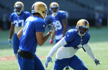 Defensive back Kevin Fogg (right) lines up a tackle during a drill at Winnipeg Blue Bombers training camp at Investors Group Field in Winnipeg on Wed., May 23, 2018. Kevin King/Winnipeg Sun/Postmedia Network