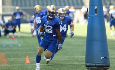 Defensive back Chandler Fenner rushes downfield during a special teams drill at Winnipeg Blue Bombers training camp at Investors Group Field in Winnipeg on Wed., May 23, 2018. Kevin King/Winnipeg Sun/Postmedia Network