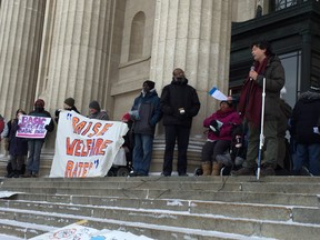 Make Poverty History's Josh Brandon addresses a rally at the Manitoba Legislature in Winnipeg on Jan. 6, 2017. (DAVID LARKINS/WINNIPEG SUN/POSTMEDIA NETWORK)