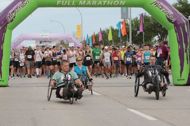 Wheelchair athletes get rolling as they compete in  full marathon wheelchair event at the 40th annual Manitoba Marathon in Winnipeg, Man., on Sunday, June 17, 2018. (Brook Jones/Postmedia Network)