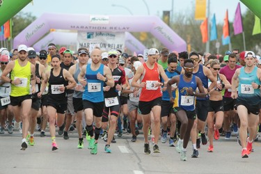 Hundreds of marathons are off and running at the start of the men's and women's full marathon at the 40th annual Manitoba Marathon in Winnipeg, Man., on Sunday, June 17, 2018. (Brook Jones/Postmedia Network)