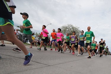 Runners participate in the relay at the 40th annual Manitoba Marathon in Winnipeg, Man., on Father's Day, Sunday, June 17, 2018. (Brook Jones/Postmedia Network)