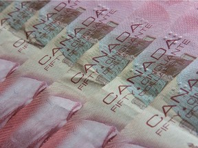 Canadians and all levels of government need to take a hard look at the debt they're accumulating and consider the consequences before taking on more, says columnist Graham Lane.