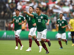 Mexico's Giovani Dos Santos celebrates after scoring against Scotland during their international friendly football match at the Azteca stadium in Mexico City, on June 2, 2018. / AFP PHOTO / Alfredo ESTRELLAALFREDO ESTRELLA/AFP/Getty Images