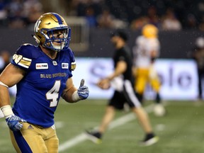 Winnipeg Blue Bombers' Adam Bighill leaves the field during CFL action against the Edmonton Eskimos in Winnipeg on Thurs., June 14, 2018. (Kevin King/Winnipeg Sun)