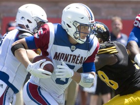 Montreal Alouettes quarterback Drew Willy runs the ball during first half preseason CFL football action against the Hamilton Tiger-Cats in Montreal on Saturday, June 9, 2018. THE CANADIAN PRESS/Peter McCabe ORG XMIT: PMC107