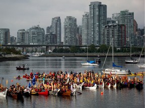 First Nations canoes gather on False Creek as part of Reconciliation Week in Vancouver, B.C., in 2013.