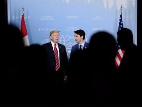 Prime Minister Justin Trudeau takes part in a meeting with U.S. President Donald Trump during the G7 Leaders Summit in La Malbaie, Que., on Friday, June 8, 2018. THE CANADIAN PRESS/Sean Kilpatrick ORG XMIT: SKP140a
