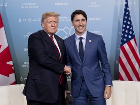 Prime Minister Justin Trudeau meets with U.S. President Donald Trump at the G7 leaders summit in La Malbaie, Que., on Friday, June 8, 2018. THE CANADIAN PRESS/Justin Tang