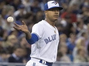 Toronto Blue Jays starting pitcher Marcus Stroman takes the ball from his catcher in fifth-inning action against the Seattle Mariners in Toronto on Tuesday May 8, 2018. (THE CANADIAN PRESS)
