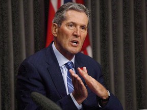 Manitoba Premier Brian Pallister speaks at the Manitoba Legislature in Winnipeg, Tuesday, November 7, 2017. The federal and Manitoba governments have reached a deal to build two new outlet channels to prevent massive flooding along Lake Manitoba and Lake St. Martin.