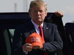 President Donald Trump arrives at Duluth International Airport, in Duluth Minn., Wednesday, June 20, 2018. Trump is in Duluth to speak at a rally for Pete Stauber, a Republican congressional candidate running in a traditionally Democratic district.