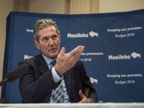 Manitoba Premier Brian Pallister speaks about the 2018 budget at the Manitoba Legislature in Winnipeg on March 12, 2018. Manitoba Premier Brian Pallister says the election of Doug Ford in Ontario does not change his plan to bring in a carbon tax in Manitoba. Ford's Progressive Conservatives have promised to fight the federal demands for a carbon tax, but Pallister's Tories are moving ahead with a $25 per tonne levy later this year.