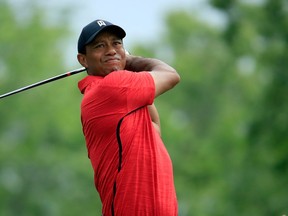 Tiger Woods watches his tee shot on the fifth hole during the final round of the Memorial Tournament at Muirfield Village Golf Club on June 3, 2018 in Dublin, Ohio.