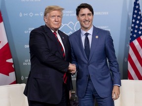 Prime Minister Justin Trudeau meets with U.S. President Donald Trump at the G7 leaders summit in La Malbaie, Que., on June 8, 2018.