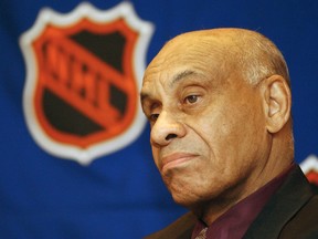 In this March 25, 2003, file photo, Willie O'Ree, the NHL's first black player and current NHL director of youth development is seen prior to being presented with the 2003 Lester Patrick Award, in Boston. (AP Photo/Patricia McDonnell, File)