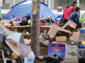 Residents of a tent city, on the grounds of a church, near the Legislative Building, in Winnipeg, have been asked to move on.  Violence, drug abuse, discarded needles, and an upcoming wedding were among the reasons for the eviction.   Wednesday, May 30, 2018.   Sun/Postmedia Network