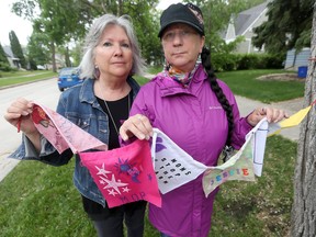 Christine Dobbs (left), and Arlene Last-Kolb have made flags to remember people who have died from, or are struggling with drug related issues.  .  Saturday, June 02, 2018.   Sun/Postmedia Network
