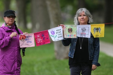 Arlene Last-Kolb (left) and Christine Dobbs  have made flags to remember people who have died from, or are struggling with drug related issues.  .  Saturday, June 02, 2018.   Sun/Postmedia Network