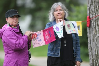 Arlene Last-Kolb (left) and Christine Dobbs  have made flags to remember people who have died from, or are struggling with drug related issues.  .  Saturday, June 02, 2018.   Sun/Postmedia Network