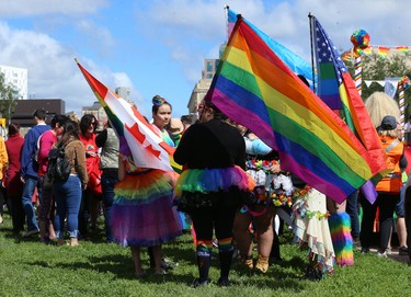 Paraders gather near the Manitoba Legislative Building grounds on Pride Day in Winnipeg on Sun., June 3, 2018. Kevin King/Winnipeg Sun/Postmedia Network