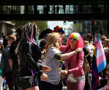 Catching up with friends during the Pride Day parade on York Avenue in Winnipeg on Sun., June 3, 2018. Kevin King/Winnipeg Sun/Postmedia Network