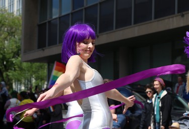 A dancer from Telus performs during the Pride Day parade on York Avenue in Winnipeg on Sun., June 3, 2018. Kevin King/Winnipeg Sun/Postmedia Network