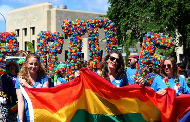 The Manitoba Liquor and Lotteries group marches during the Pride Day parade on York Avenue in Winnipeg on Sun., June 3, 2018. Kevin King/Winnipeg Sun/Postmedia Network
