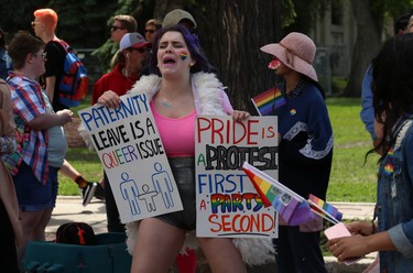 An attendee gets messages across during the Pride Day parade on York Avenue in Winnipeg on Sun., June 3, 2018. Kevin King/Winnipeg Sun/Postmedia Network