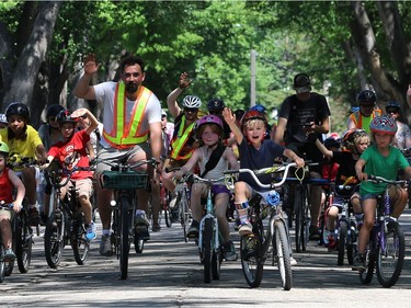 Participants in the Fam Jam Wheel Jam arrive at Omand Park along Wolseley Avenue in Winnipeg on Sun., June 10, 2018. Kevin King/Winnipeg Sun/Postmedia Network