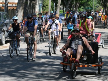 Participants in the Fam Jam Wheel Jam arrive at Omand Park along Wolseley Avenue in Winnipeg on Sun., June 10, 2018. Kevin King/Winnipeg Sun/Postmedia Network