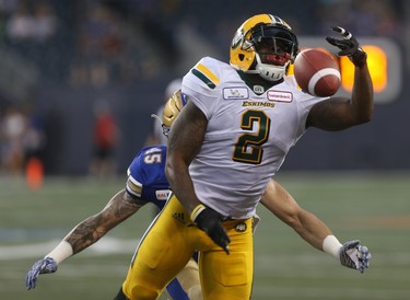 Edmonton Eskimos' C.J.Gable (2) attempts to make a catch under coverage from Winnipeg Blue Bombers' Jovan Santos-Knox (45) during CFL action in Winnipeg today.   Thursday, June 14, 2018.   Sun/Postmedia Network