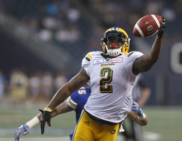 Edmonton Eskimos' C.J.Gable (2) attempts to make a catch under coverage from Winnipeg Blue Bombers' Jovan Santos-Knox (45) during CFL action in Winnipeg today.   Thursday, June 14, 2018.   Sun/Postmedia Network