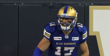 Winnipeg Blue Bombers QB Chris Streveler celebrates in the end zone after throwing his first CFL touchdown pass, against the Edmonton Eskimos, during CFL action in Winnipeg on Thurs., June 14, 2018. Kevin King/Winnipeg Sun/Postmedia Network