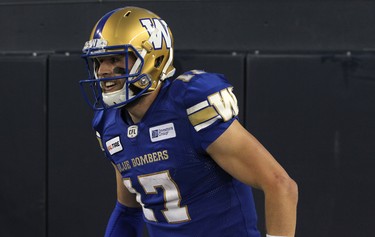 Winnipeg Blue Bombers QB Chris Streveler celebrates in the end zone after throwing his first CFL touchdown pass, against the Edmonton Eskimos, during CFL action in Winnipeg on Thurs., June 14, 2018. Kevin King/Winnipeg Sun/Postmedia Network