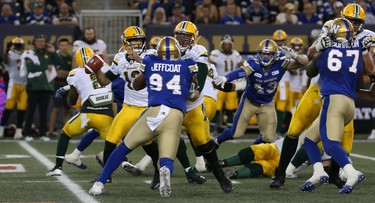 Edmonton Eskimos QB Mike Reilly throws from the pocket during CFL action against the Winnipeg Blue Bombers in Winnipeg on Thurs., June 14, 2018. Kevin King/Winnipeg Sun/Postmedia Network